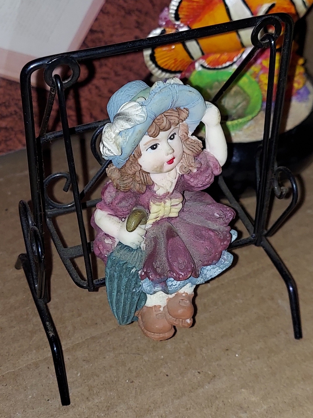 Porch Swing Southern Bell Figurine Wearing Blue Hat And Pink Dress